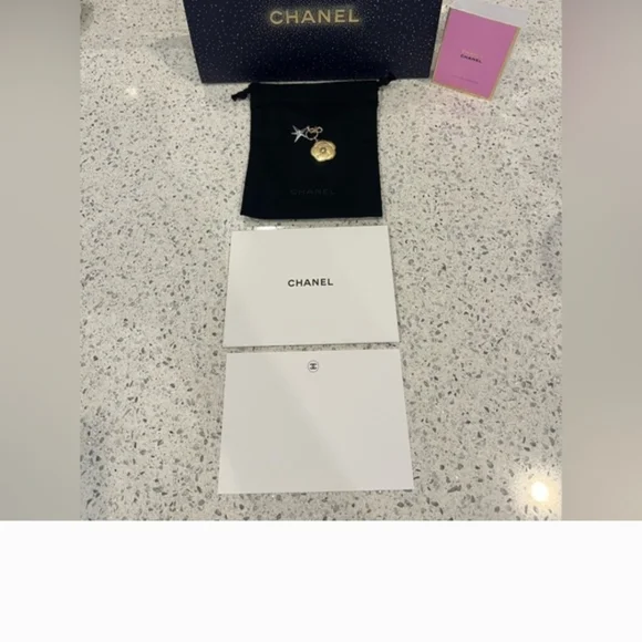 CHANEL Gold Floral and Silver Star Charm and Chanel gift bag accessories - Picture 2 of 12